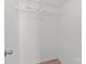 Empty closet features wire shelving and light colored wood floors at 9405 Old Concord Rd # G, Charlotte, NC 28213