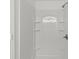 Clean white tiled shower with built in shelves at 9405 Old Concord Rd # G, Charlotte, NC 28213