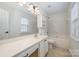 Bathroom featuring a large vanity, mirror, tile flooring and shower-tub combination at 10130 Illoria Dr, Charlotte, NC 28273