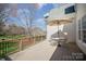 The back deck offers an outdoor dining space and views of the home's backyard at 10502 Orchid Hill Ln, Charlotte, NC 28277