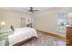 Comfortable bedroom with hardwood floors and ample natural light at 10502 Orchid Hill Ln, Charlotte, NC 28277