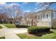 Well-maintained home with a manicured lawn and attached garage, located on a quiet street at 10502 Orchid Hill Ln, Charlotte, NC 28277