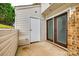 Patio features storage and glass doors for natural light at 10961 Carmel Crossing Rd, Charlotte, NC 28226