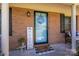 Welcoming front porch with brick facade, decorative door, and cozy seating at 119 Tara Ter, Kings Mountain, NC 28086