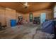Spacious garage with storage, natural light, and multiple access doors at 119 Tara Ter, Kings Mountain, NC 28086