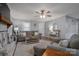 Comfortable living room with ceiling fan, plush sofa, and view of front entrance at 119 Tara Ter, Kings Mountain, NC 28086