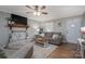 Cozy living room with decorative fireplace, comfortable seating, and natural light at 119 Tara Ter, Kings Mountain, NC 28086