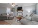 Cozy living room with fireplace, TV, ceiling fan and comfortable seating area at 119 Tara Ter, Kings Mountain, NC 28086