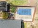 Aerial view of a fenced in backyard with a covered pool and fire pit at 119 Tara Ter, Kings Mountain, NC 28086