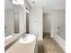 Bathroom featuring a vanity with sink and a separate bathtub and toilet area at 1326 Dunmore Ct, Clover, SC 29710