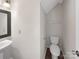 Simple half bathroom with a pedestal sink and a standard toilet at 1326 Dunmore Ct, Clover, SC 29710