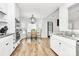 Eat-in kitchen with modern appliances and hardwood floors at 13930 Thompson Rd, Mint Hill, NC 28227