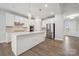 Beautiful kitchen with a spacious island, stainless steel appliances, and modern white cabinetry at 1439 Hubert Graham Way, Tega Cay, SC 29708
