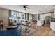 Open-concept living room, dining room and kitchen filled with natural light and stylish decor at 15212 Caspian Way, Charlotte, NC 28278