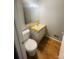 Compact bathroom features a vanity with updated sink, perfect for functionality and maximizing space at 1608 Van Dyke Dr, Charlotte, NC 28213