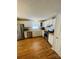 Well-lit kitchen features stainless steel appliances and modern countertops, perfect for cooking and entertaining at 1608 Van Dyke Dr, Charlotte, NC 28213