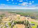 Aerial view showcasing property and surrounding landscape with trees at 164 Linderman Lake Ln, Kings Mountain, NC 28086