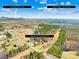 Scenic aerial view showcasing the proximity to Crowders Mountain State Park and downtown Gastonia at 164 Linderman Lake Ln, Kings Mountain, NC 28086