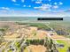 Aerial view of a large lot with open land and wooded areas, lot lines are approximate at 164 Linderman Lake Ln, Kings Mountain, NC 28086