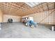 Large barn interior with tall ceilings and plenty of space for vehicles and equipment at 164 Linderman Lake Ln, Kings Mountain, NC 28086
