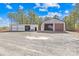 Exterior view of the two barns on the property, offering ample storage and workspace at 164 Linderman Lake Ln, Kings Mountain, NC 28086