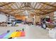 Spacious garage with high ceilings and exposed rafters at 164 Linderman Lake Ln, Kings Mountain, NC 28086