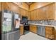 Well-equipped kitchen featuring stainless steel appliances, granite countertops, and ample cabinet space at 164 Linderman Lake Ln, Kings Mountain, NC 28086