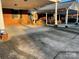 Wide carport providing ample parking space and shelter, connected seamlessly to the brick facade of the home at 19915 Oak Leaf Cir, Cornelius, NC 28031