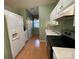 Kitchen with white appliances and plenty of cabinet space at 19915 Oak Leaf Cir, Cornelius, NC 28031