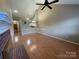 Open concept living room with vaulted ceilings and fireplace at 19915 Oak Leaf Cir, Cornelius, NC 28031