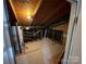 Unfinished storage area with exposed ductwork, water heater, and unfinished flooring at 19915 Oak Leaf Cir, Cornelius, NC 28031