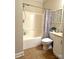 Bright bathroom features a shower-tub combination and a white vanity, creating a clean and functional space at 205 Edenshire Ct, Indian Trail, NC 28079