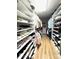 Organized walk-in closet with ample shelving provides abundant storage for clothing and accessories at 205 Edenshire Ct, Indian Trail, NC 28079