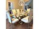 Elegant dining room featuring glass table, seating for six, with modern chandelier at 205 Edenshire Ct, Indian Trail, NC 28079