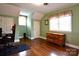 Cozy bedroom with hardwood floors, natural light, and ample closet space at 215 Biscoe Rd, Troy, NC 27371