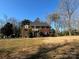 Charming two story brick home with a beautiful front yard at 215 Biscoe Rd, Troy, NC 27371