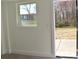 Bedroom with open doorway looking out to the backyard at 244 Stilwell Oaks Cir, Charlotte, NC 28212