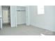 Bright bedroom featuring a closet and a sliding door for an open, airy feel and modern living at 244 Stilwell Oaks Cir, Charlotte, NC 28212
