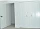 Bedroom with bi-fold closet doors at 244 Stilwell Oaks Cir, Charlotte, NC 28212