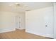 Neutral living room with white walls and modern light fixture at 244 Stilwell Oaks Cir, Charlotte, NC 28212