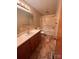 Bathroom featuring a vanity sink, a standard toilet, and a shower over tub at 2458 Morningside Dr, Lancaster, SC 29720