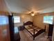 Bedroom with neutral walls and carpet, ceiling fan, and a frame for a bed at 2458 Morningside Dr, Lancaster, SC 29720