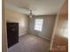 Small bedroom with neutral walls, ceiling fan, and a window with natural light at 2458 Morningside Dr, Lancaster, SC 29720