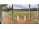 Panoramic view from back deck overlooking fenced lot and scenic greenery at 3032 Morning Glory Ln, Vale, NC 28168