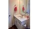 Clean bathroom with white vanity, modern faucet, and a well-lit mirror at 3032 Morning Glory Ln, Vale, NC 28168