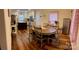 Eat-in kitchen with a round dining table set, and wood flooring at 3032 Morning Glory Ln, Vale, NC 28168