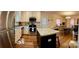 Spacious kitchen featuring white cabinets, stainless appliances, and center island at 3032 Morning Glory Ln, Vale, NC 28168