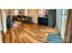 Open-concept living room features hardwood flooring and natural light at 3032 Morning Glory Ln, Vale, NC 28168