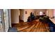 A view of the spacious living room and beautiful wood flooring at 3032 Morning Glory Ln, Vale, NC 28168