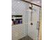 Modern tiled shower with glass door and multi-setting shower head at 3032 Morning Glory Ln, Vale, NC 28168